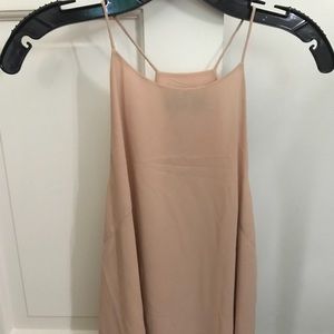 Tan/light pink sleeveless blouse